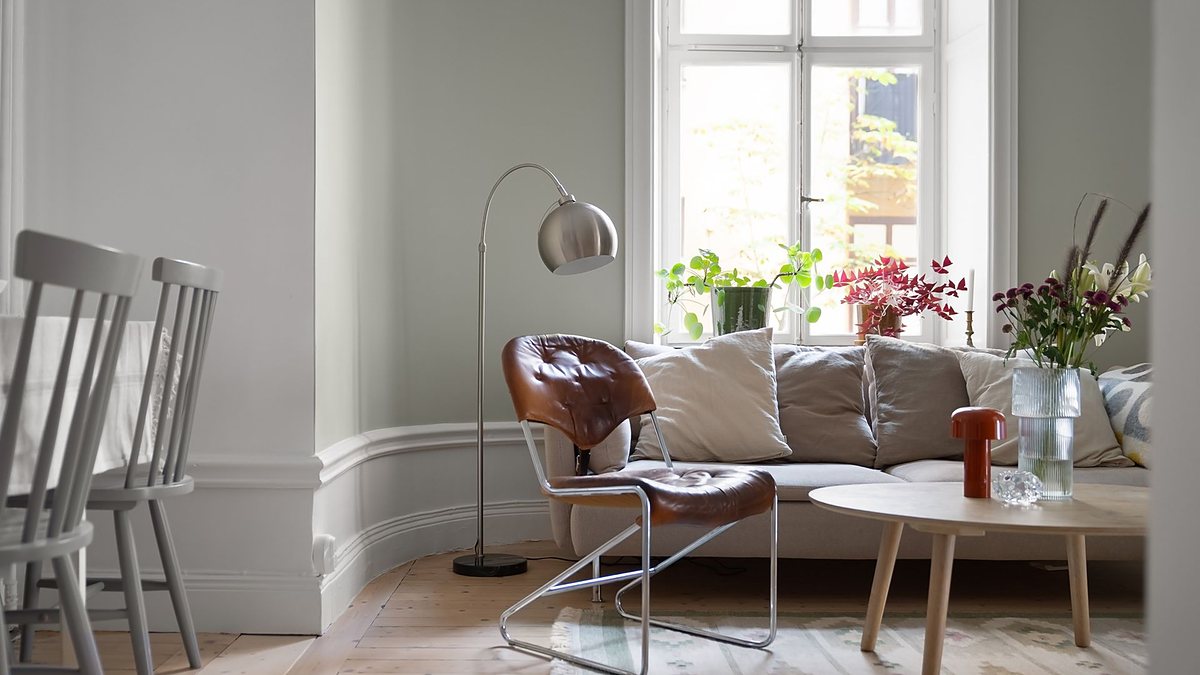 Bright Scandinavian living room with modern furniture and natural light