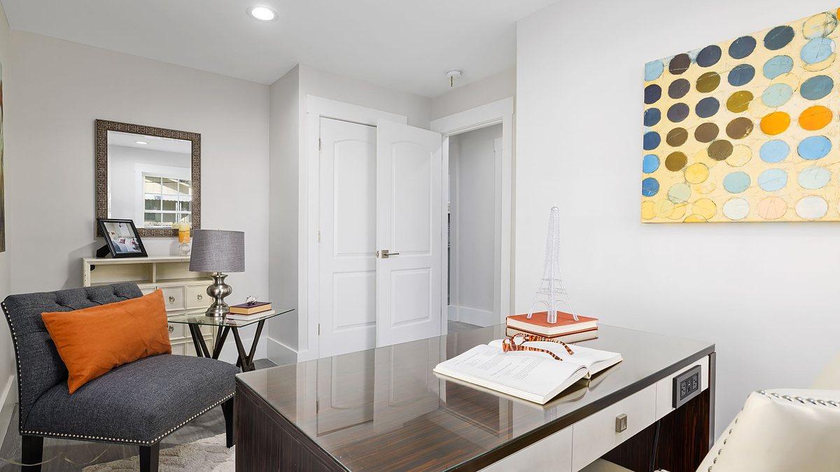 Bright modern home office with stylish furniture and decor